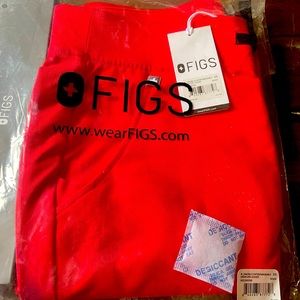 New in package neon red FIGS Zamora scrub pants/joggers. Size XS.